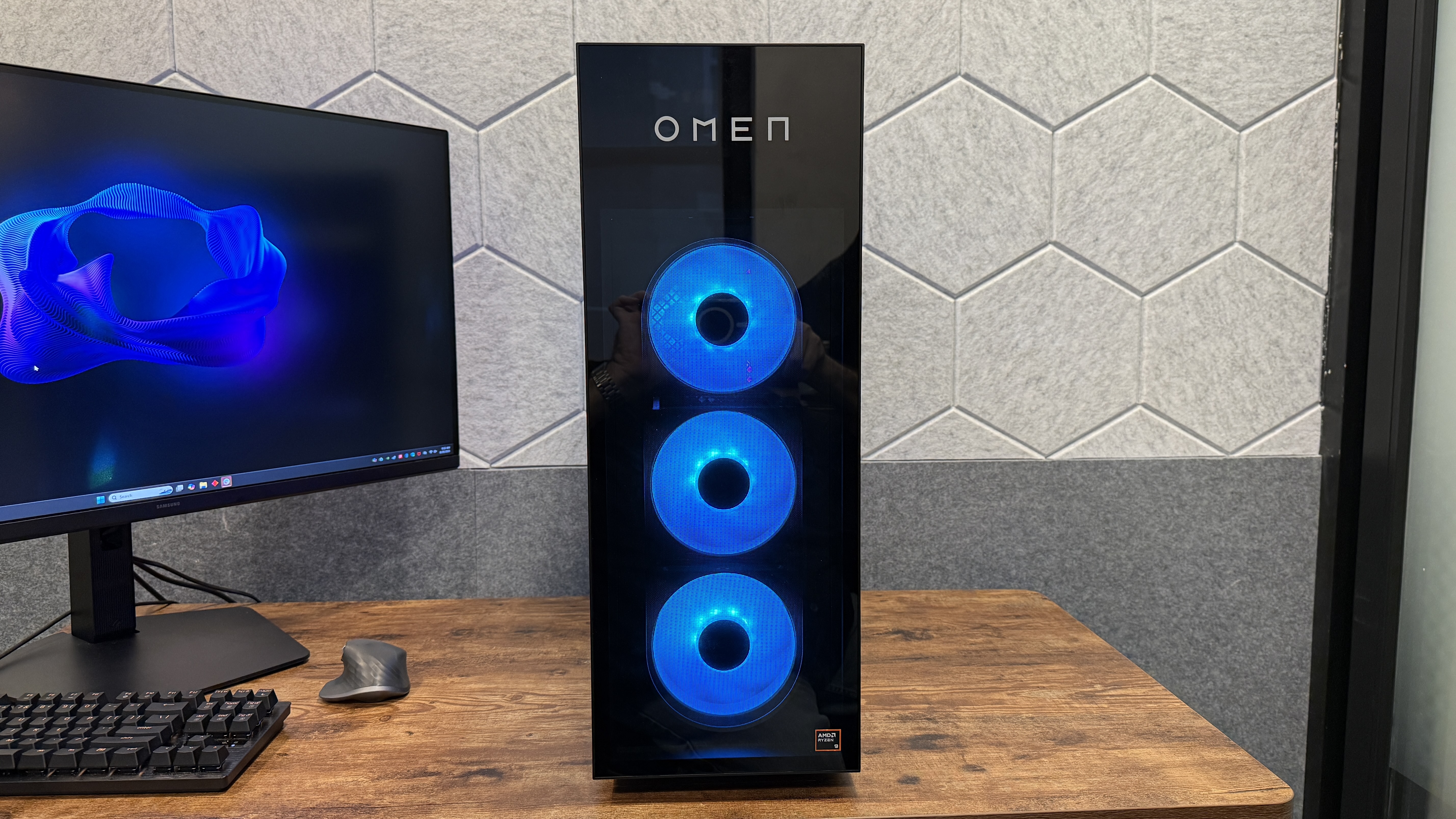 The HP Omen Max 45L on a desk showing off its front fans