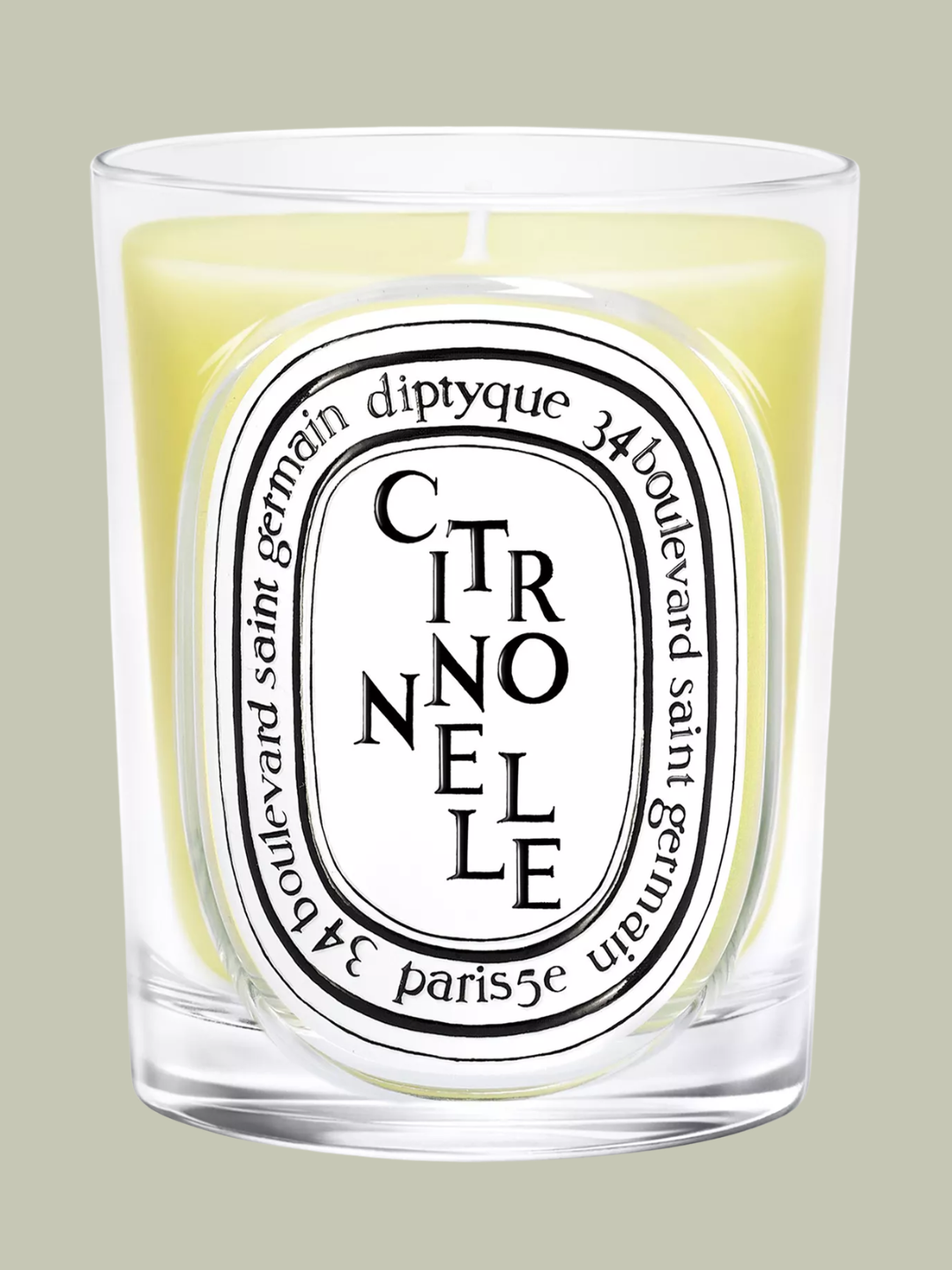A small citronella scented glass candle from Diptyque