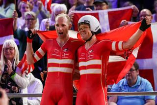 Denmark’s Michael Mørkøv (left) and Lasse Norman Hansen celebrate after winning the men’s Madison at the 2020 UCI Track World Championships in Berlin, Germany