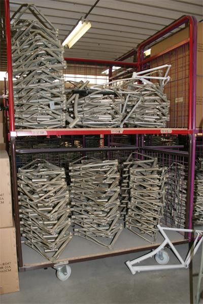 A stack of unpainted frames