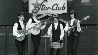 L-R Mary McGlory, Pamela Birch, Sylvia Saunders and Valerie Gell of Liverpool band The Liverbirds pose for a group portrait outside the Star Club c 1963 in Hamburg, Germany