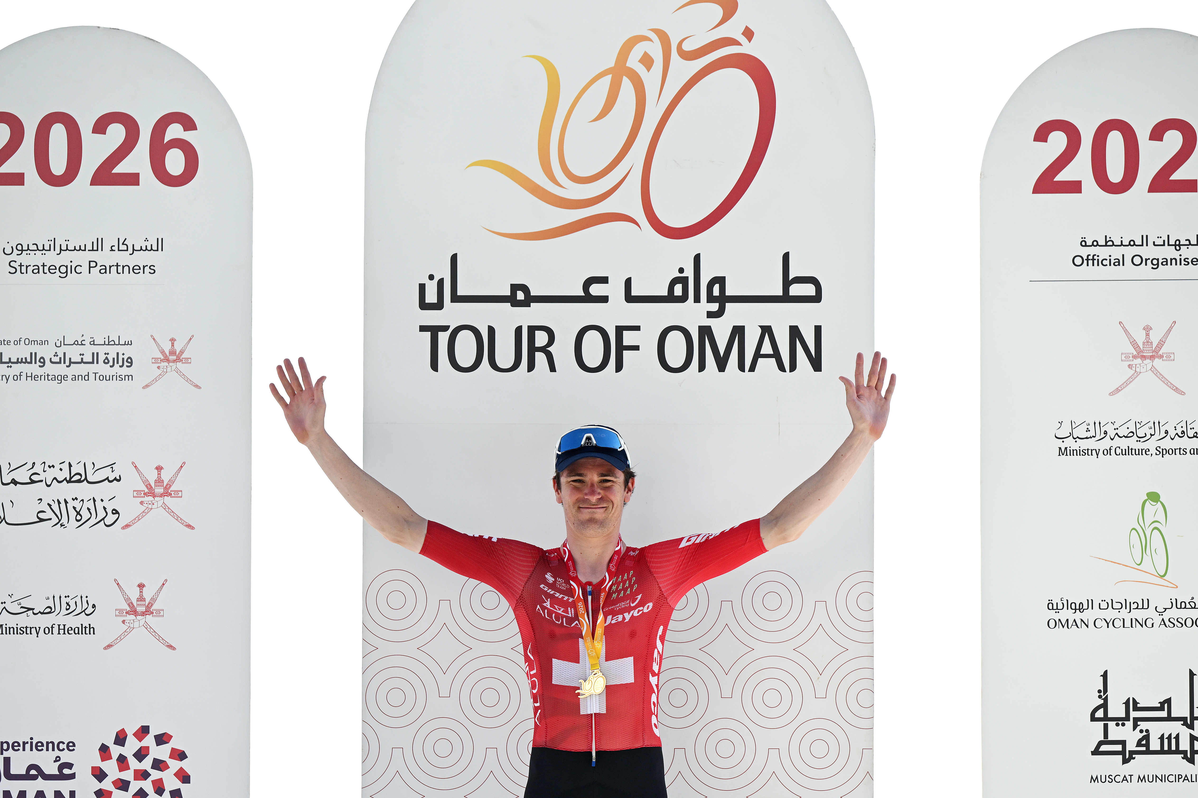 MISFAT AL ABRIYEEN, OMAN - FEBRUARY 09: Mauro Schmid of Switzerland and Team Jayco AlUla celebrates at podium as winner during the 15th Tour of Oman 2026, Stage 3 a 191.3km stage from Samail - Al Fayhaa Rest house to Misfat Al Abriyeen - Eastern Mountain 921m on February 09, 2026 in Misfat Al Abriyeen, Oman. (Photo by Dario Belingheri/Getty Images)