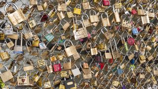 Love locks attached to fence