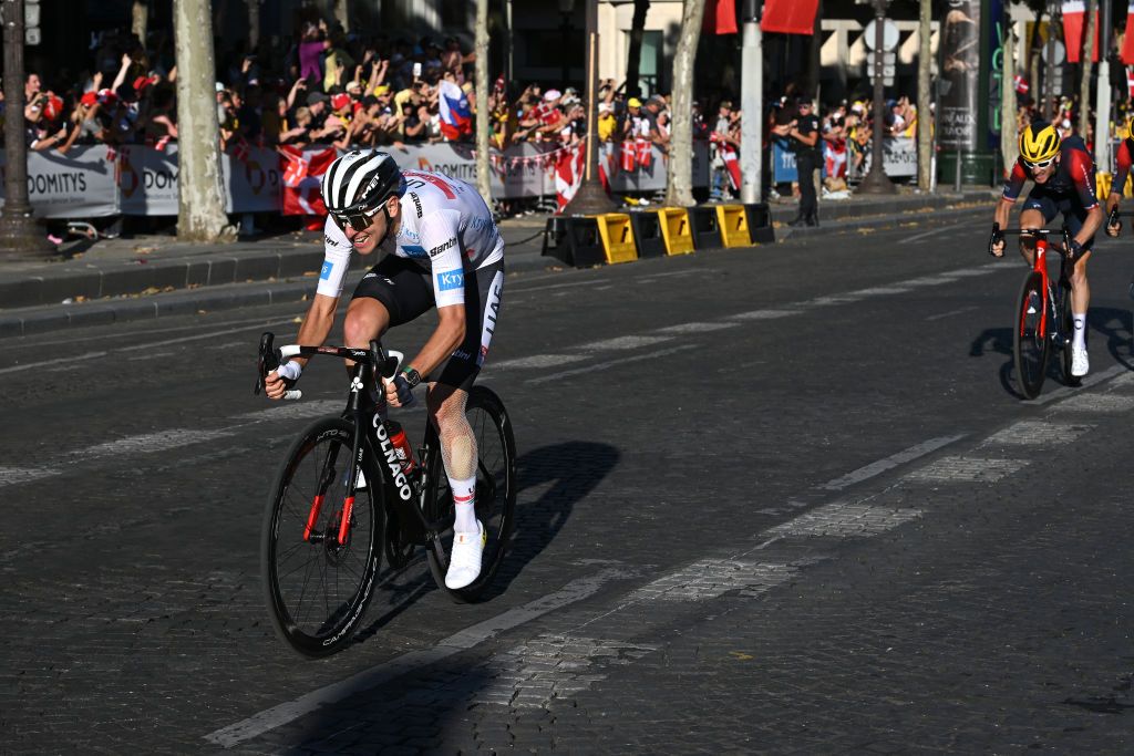 PARIS FRANCE JULY 24 Tadej Pogacar of Slovenia and UAE Team Emirates white best young jersey attacks in the breakaway during the 109th Tour de France 2022 Stage 21 a 1156km stage from Paris La Dfense to Paris Champslyses TDF2022 WorldTour on July 24 2022 in Paris France Photo by Dario BelingheriGetty Images