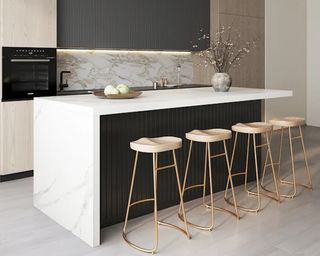 Marble kitchen counter with four barstools