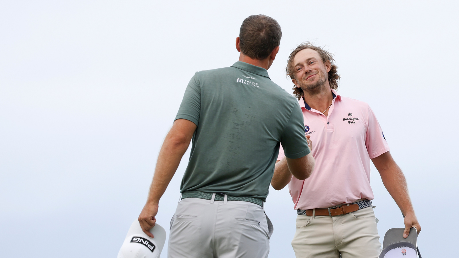 Austin Smotherman shakes hands with Seamus Power