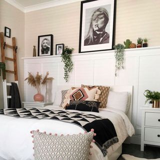 bedroom with wood panelled wall