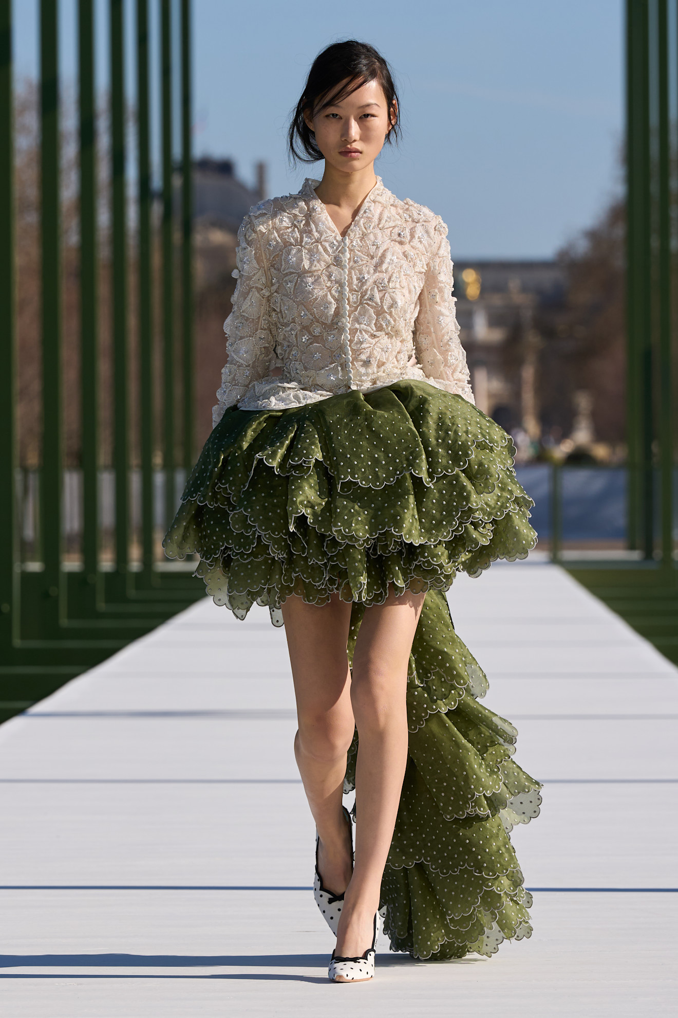 Dior model wearing a fall 2026 runway look.