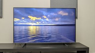 Samsung Q60D with sunset on screen