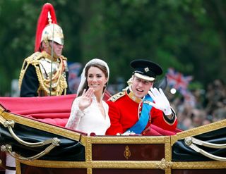 Catherine, Duchess of Cambridge and Prince William, Duke of Cambridge travel down The Mall,