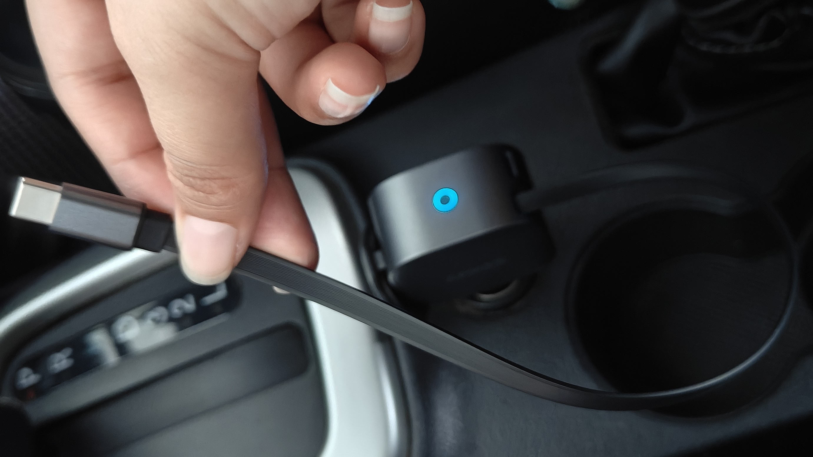 Anker Nano 75W Car Charger inside a car