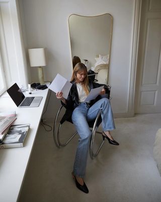 @ _jeanettemadsen_ wearing high-waisted jeans with a blazer and heels