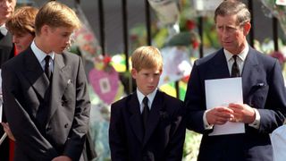 The Prince of Wales with Prince William and Prince Harry outside Westminster Abbey at the funeral of Diana, The Princess of Wales on September 6, 1997.