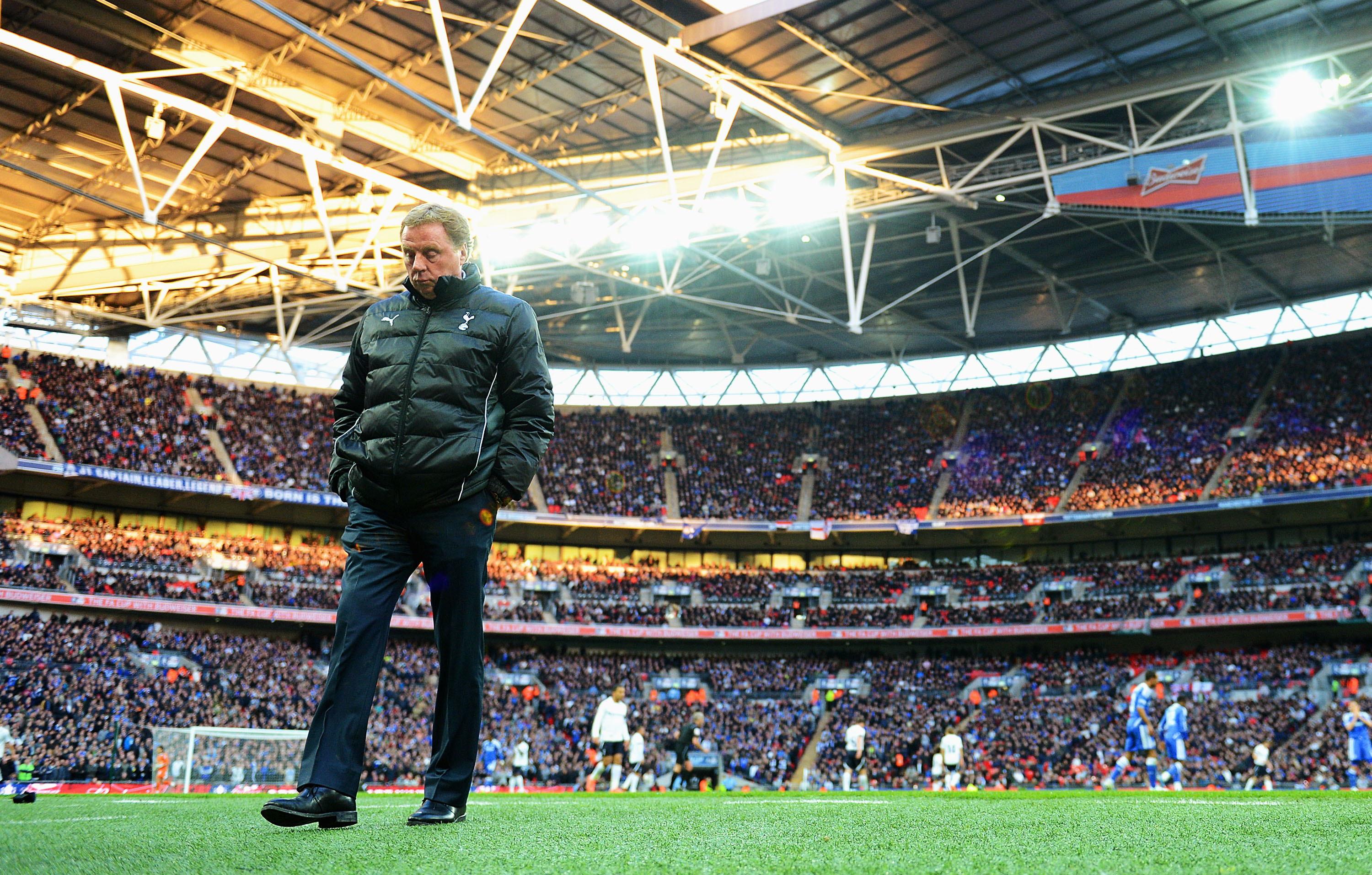 Tottenham manager Harry Redknapp looks dejected during his side's FA Cup semi-final defeat to Chelsea in April 2012.