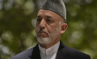 Afghan President Hamid Karzai at a news conference Tuesday confirming the death of his influential half-brother Ahmed Wali Karzai.