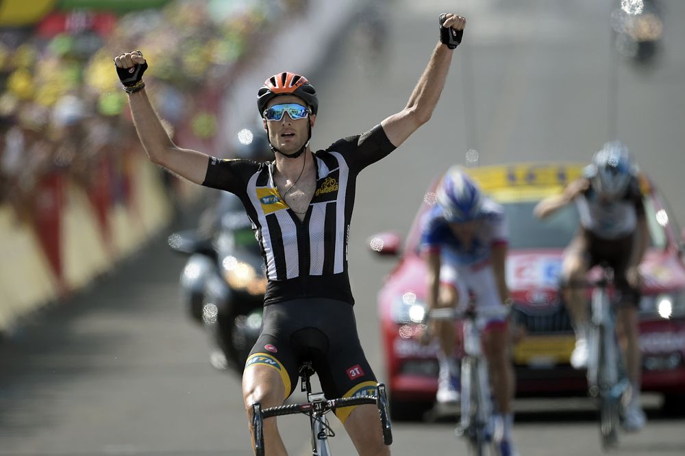 Steven Cummings of African team MTN-Qhubeka wins stage 14 of the Tour de France on Nelson Mandela day.
