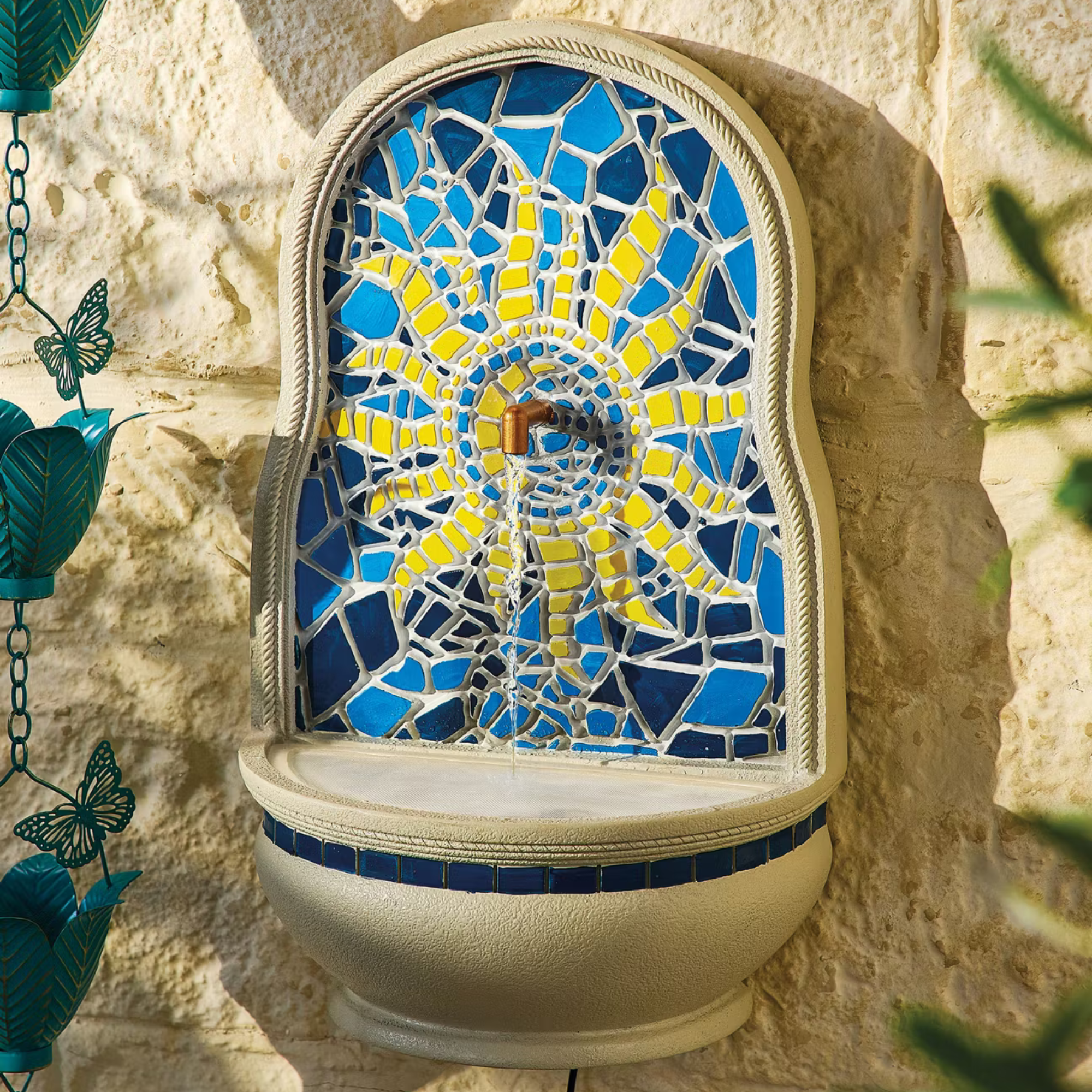 Aldi mosaic water feature on a wall