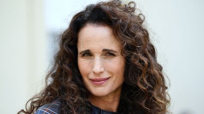 US actress and model Andie MacDowell poses as she arrives for the Cedric Charlier Spring-Summer 2019 Ready-to-Wear collection fashion show in Paris, on September 28, 2018