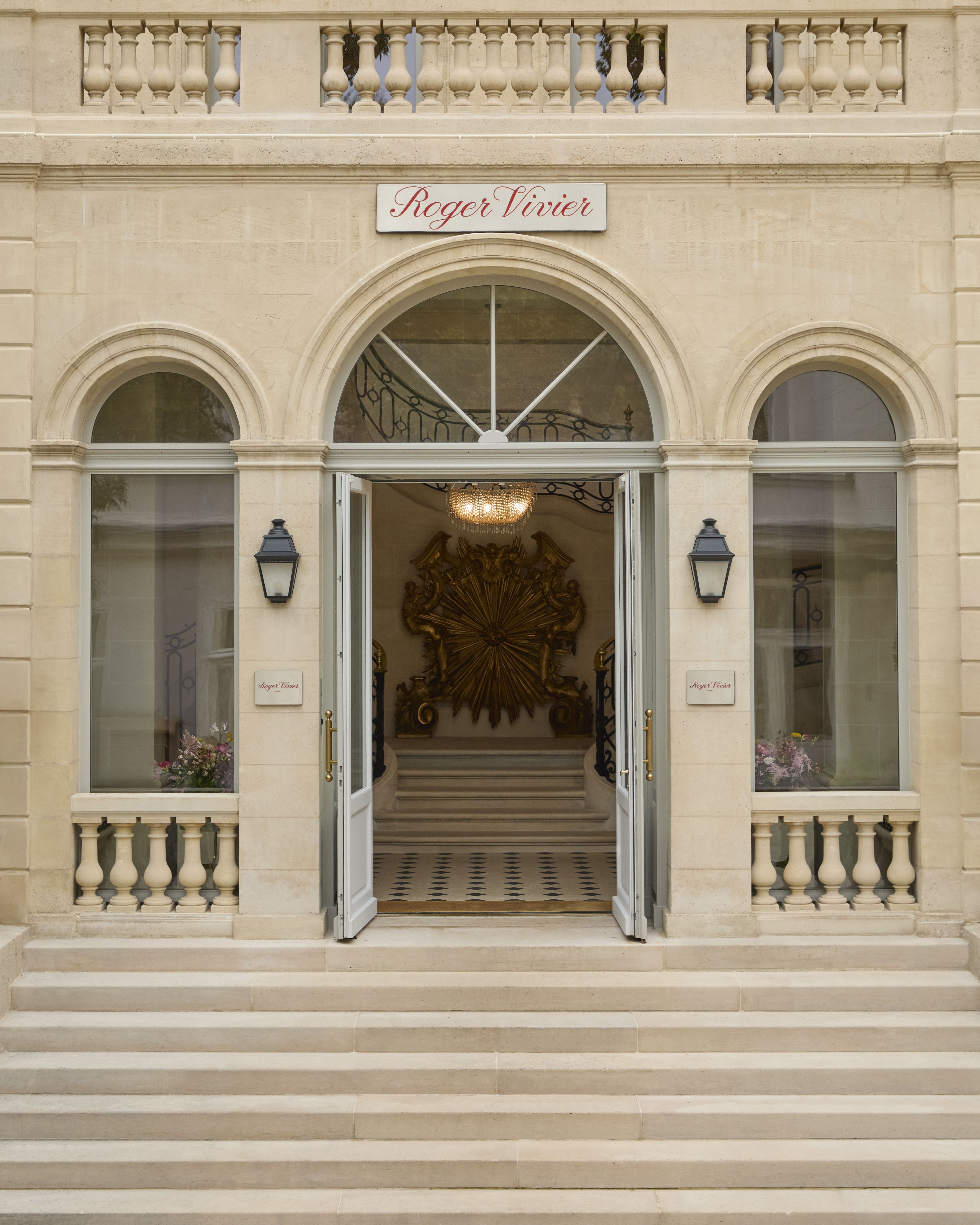 The various rooms of a palatial 18th-century residence have been restored into an art and antiques-filled fashion maison headquarters and archive.