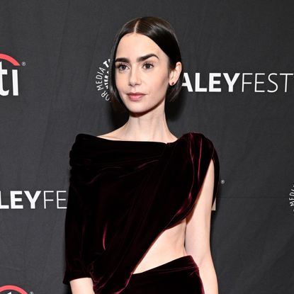 Emily in Paris star Lily Collins wears a Balenciaga cut-out dress with high-vamp heels