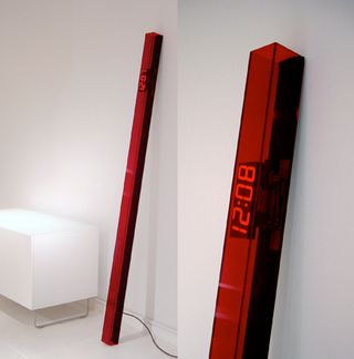 two red Perspex rectangular tube with digital clock