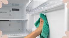 woman cleaning inside of fridge with a green cloth to show how to clean a fridge