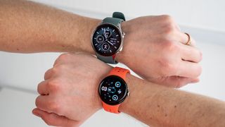 The OnePlus Watch 2 and Pixel Watch 2 worn on left and right wrists