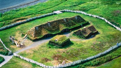 An aerial image of the structures at L'Anse aux Meadows