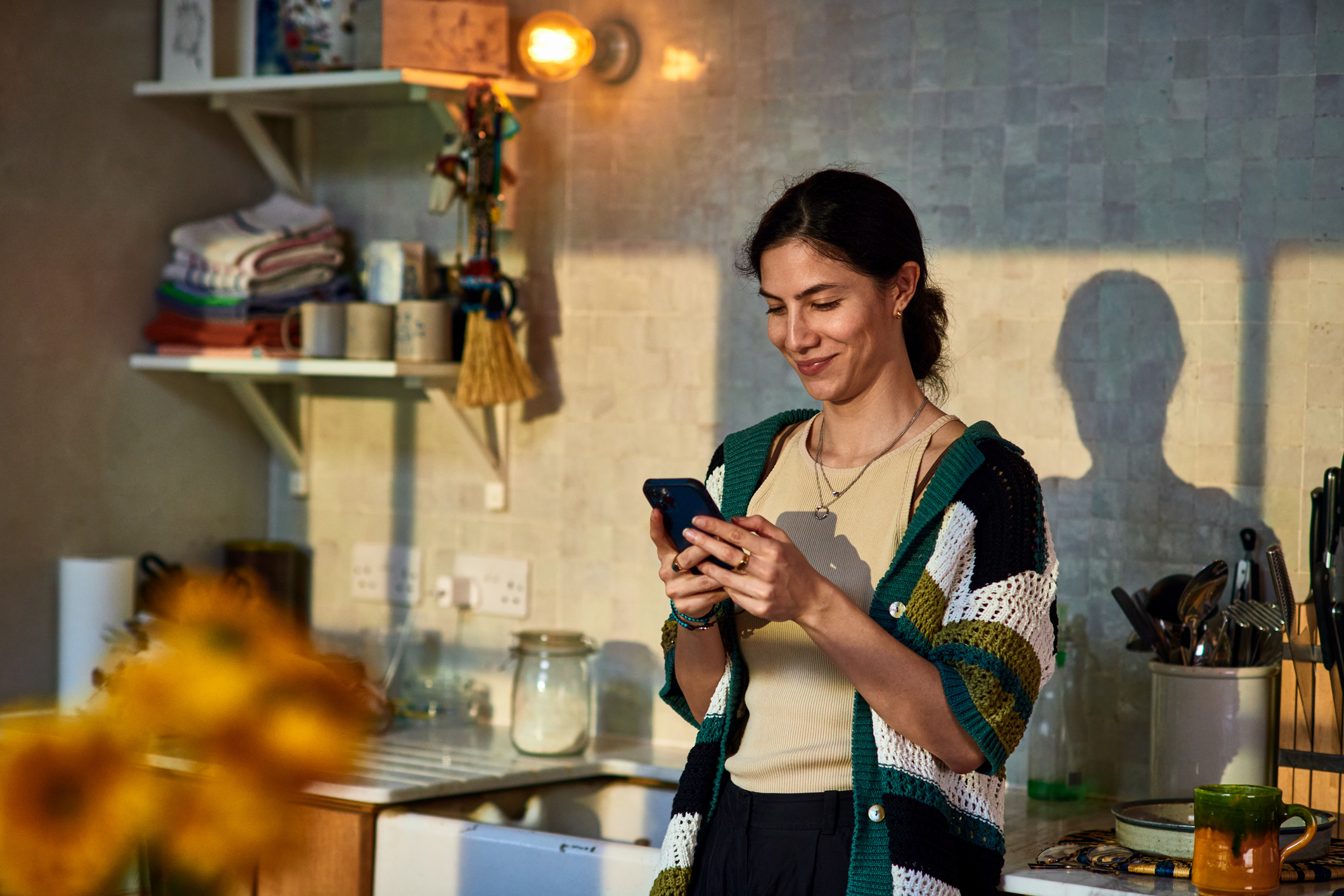 Millennial woman looking at personal finances on phone