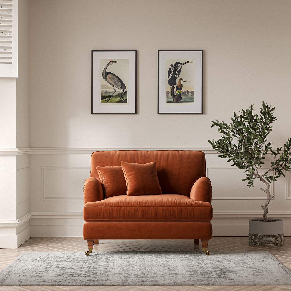 Emeline Velvet Snuggle Chair With Castor Legs