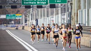 New York Marathon live stream as runners head over a bridge