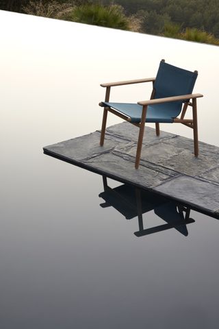 B&B Italia outdoor furniture launched in 2023: chair beside water