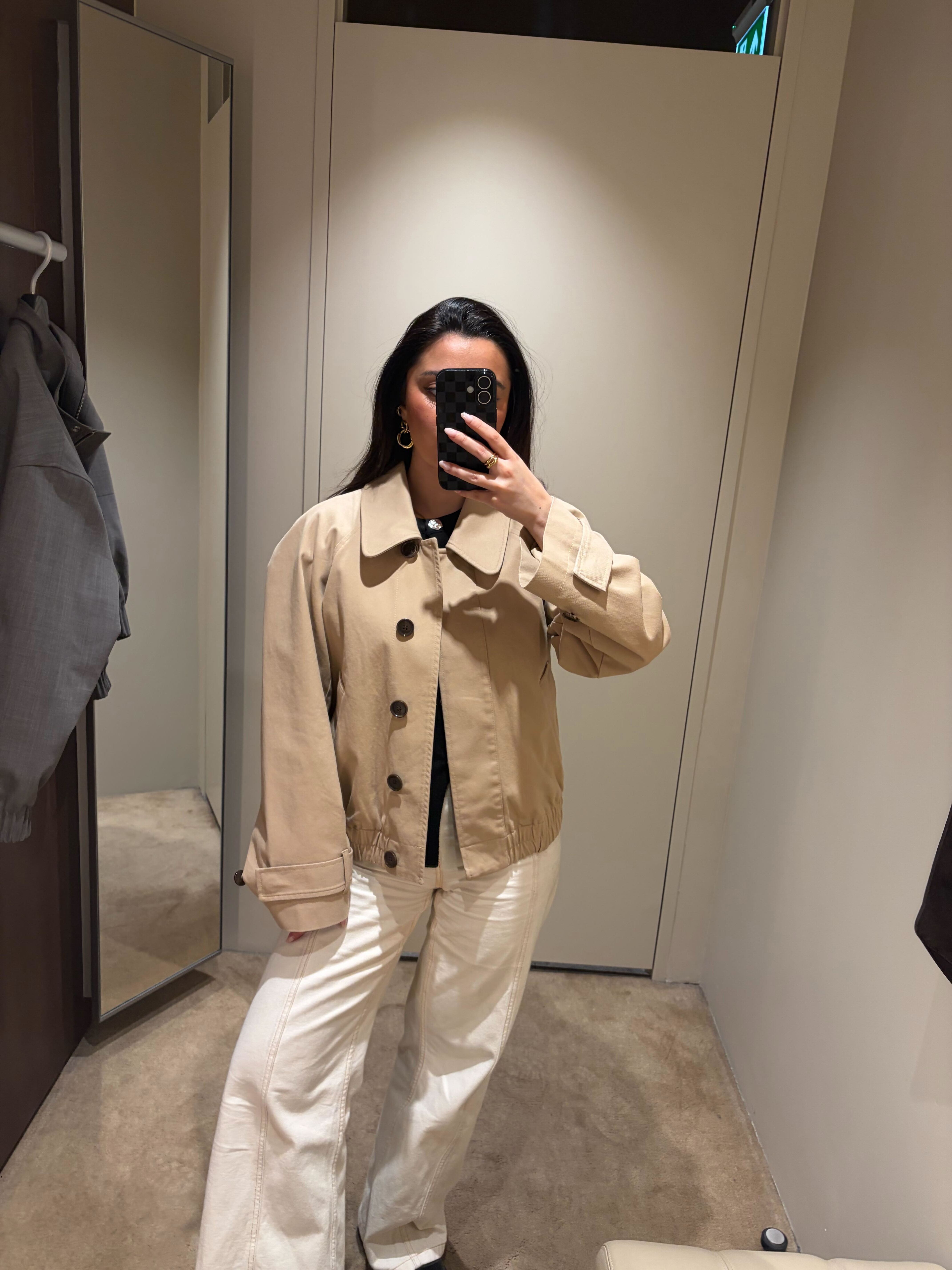 Marina wearing COS light jacket