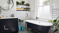 picture of bathroom with black and white bathtub 