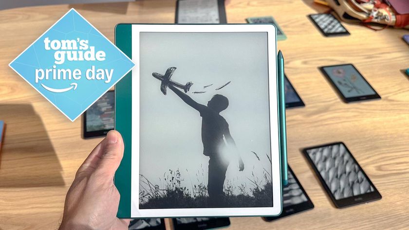 Kindle Scribe 2024 in hand with Tom&#039;s Guide Prime Day badge