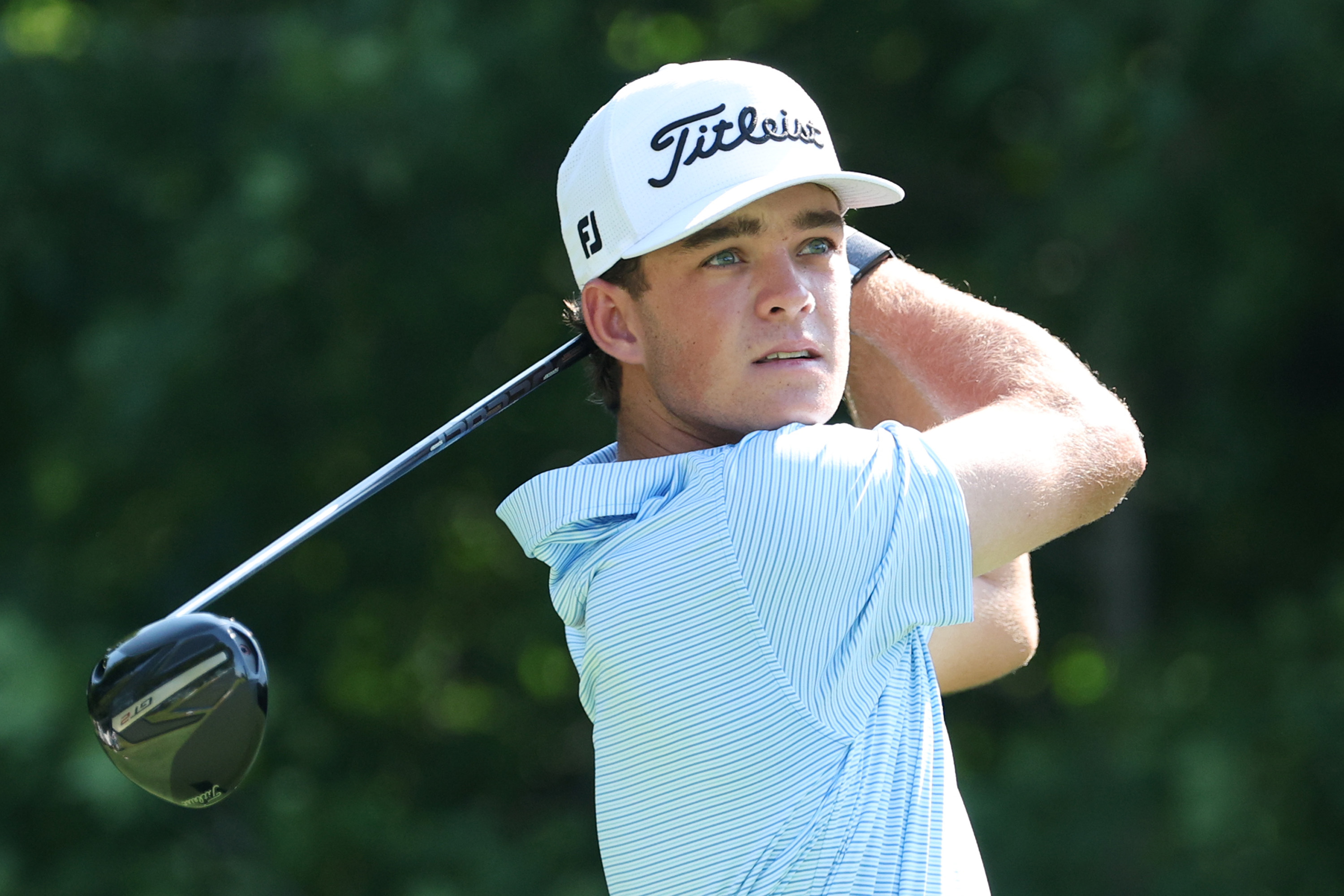 Jackson Koivun hits a driver off the tee