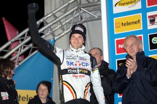 Albert waves to the crowd from the podium
