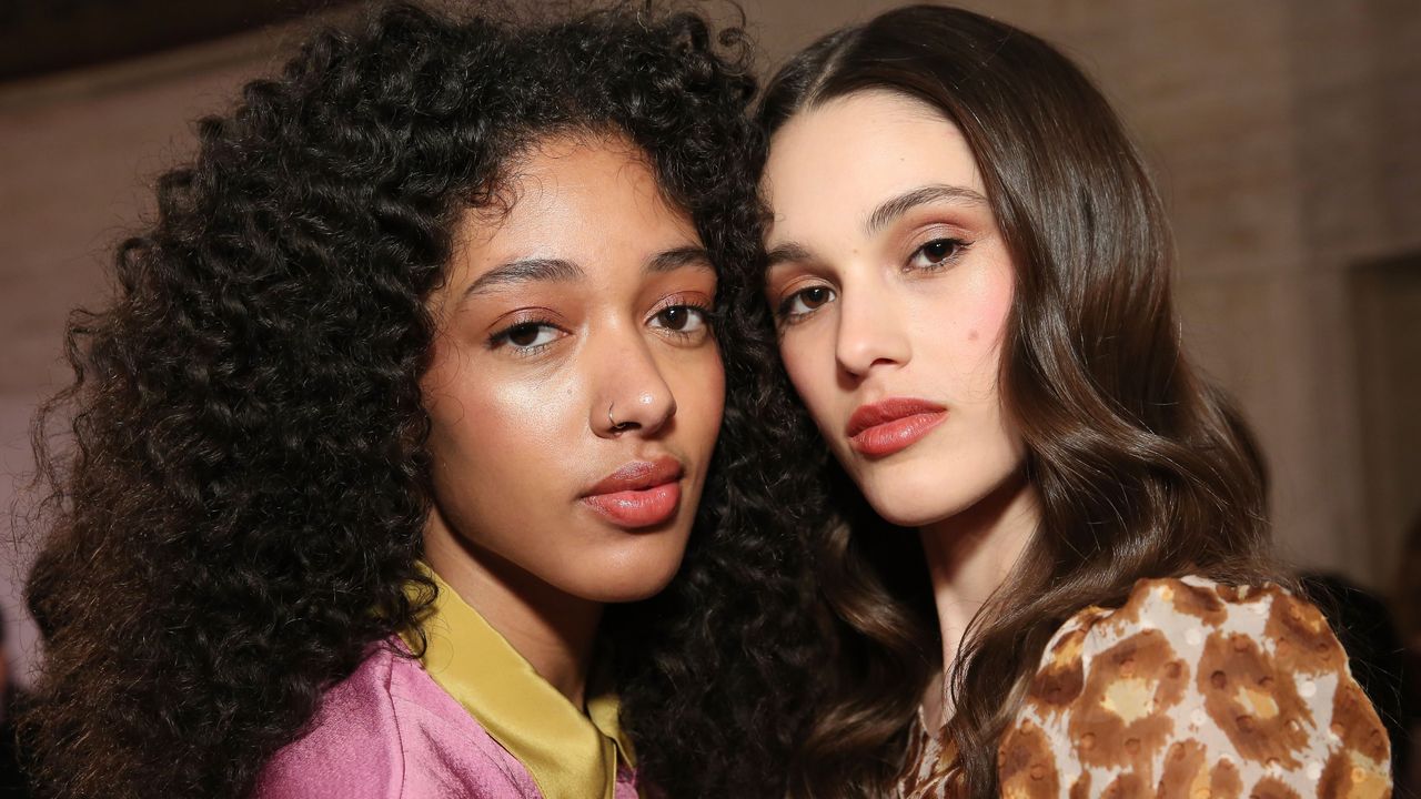 two models wearing bronzer