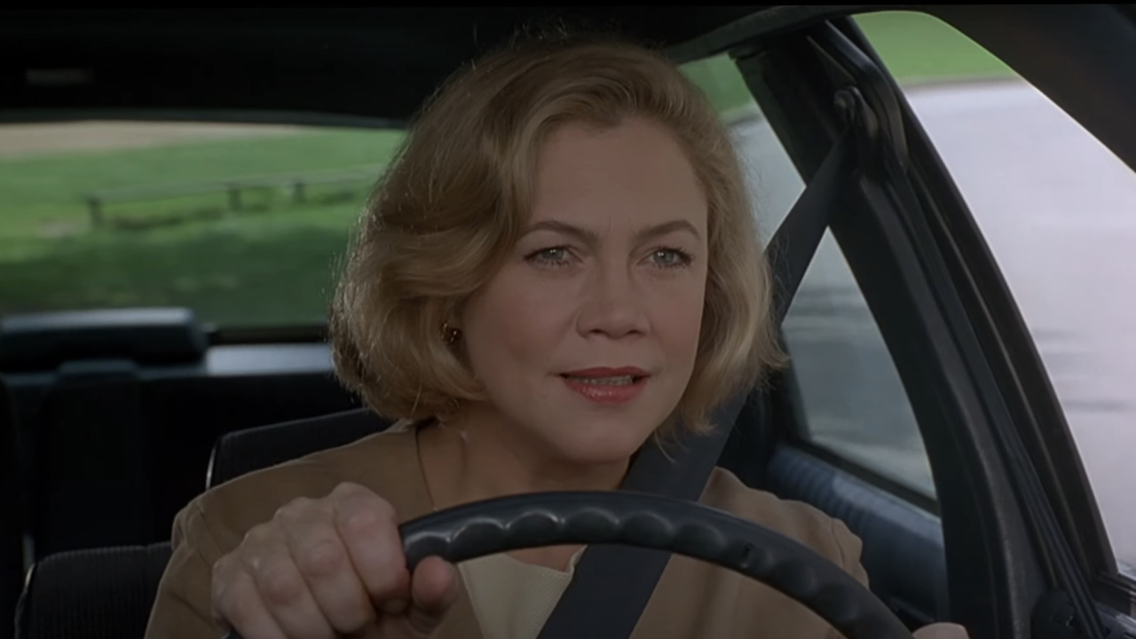 Kathleen Turner driving a car in Serial Mom