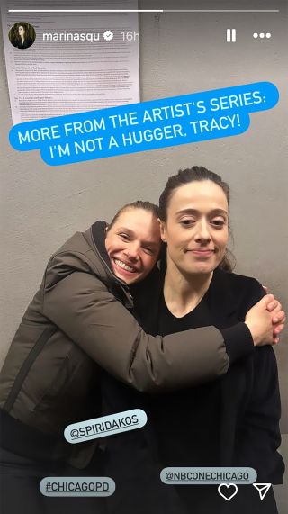 Marina Squerciati and Tracy Spiridakos hug while filming her final Chicago PD ep.