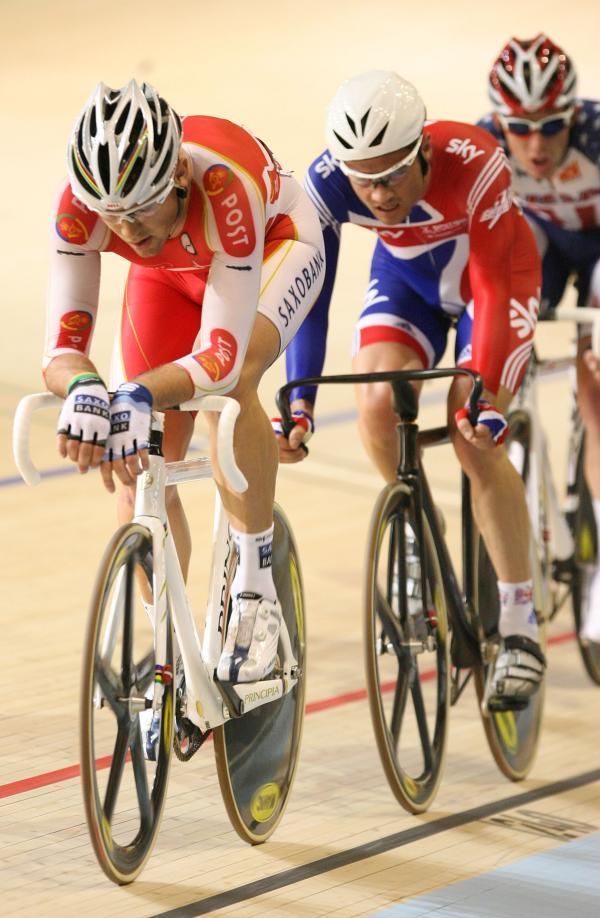 Alex Rasmussen (Denmark) hits the front with Chris Newton (Great Britain) on his wheel in the men's scratch race.