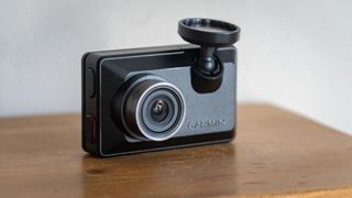 Garmin Dash Cam X310 on a wooden table