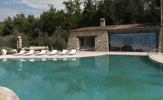 Aquapetra Spa with swimming pool and trees