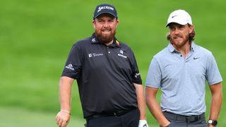 Shane Lowry and Tommy Fleetwood in discussion during the second round of the BMW PGA Championship at Wentworth