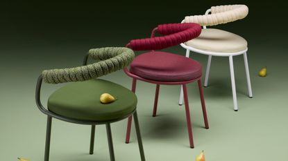 three S-CAB Koala outdoor chairs in green, red, and white