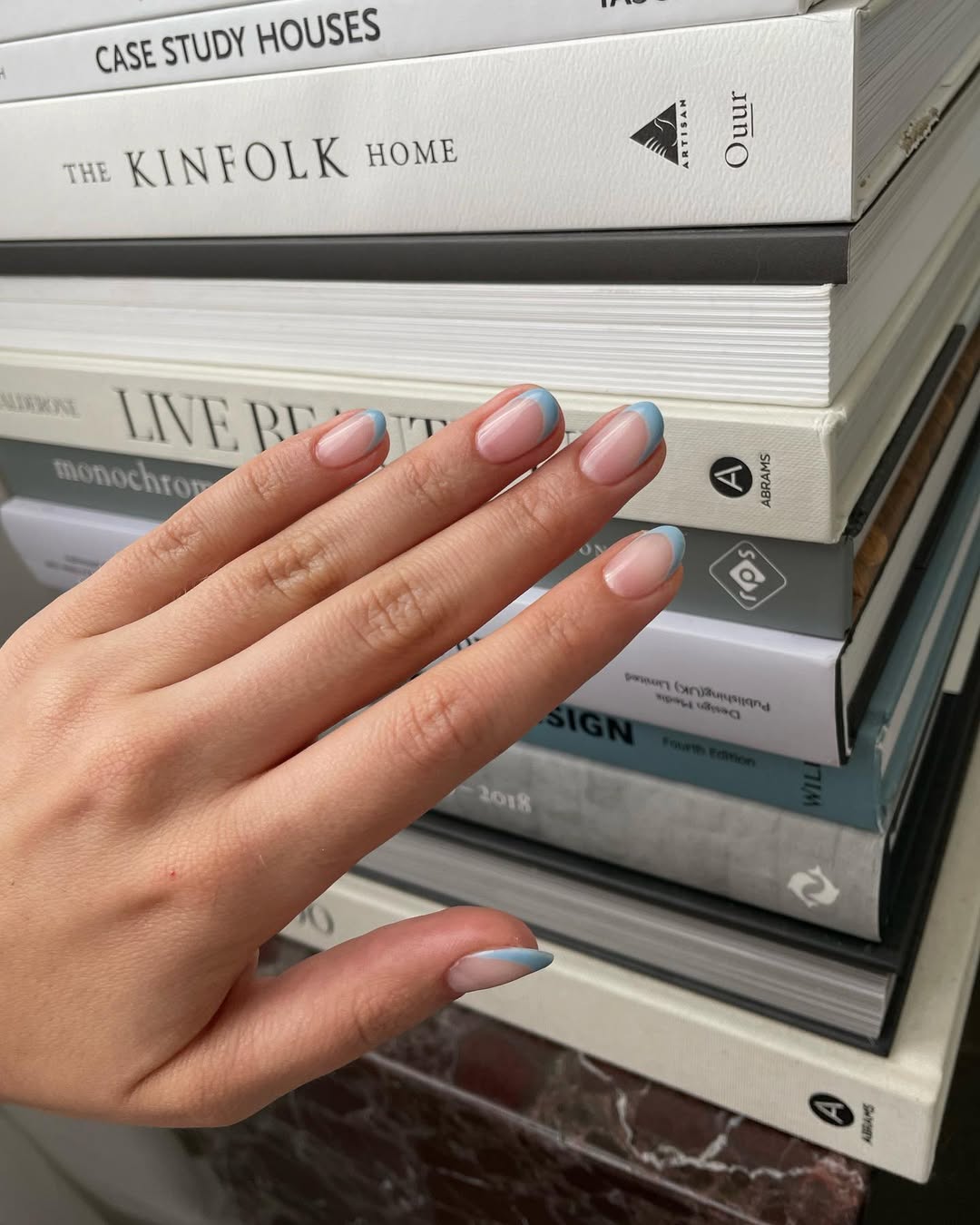 Pastel blue short French tip nails