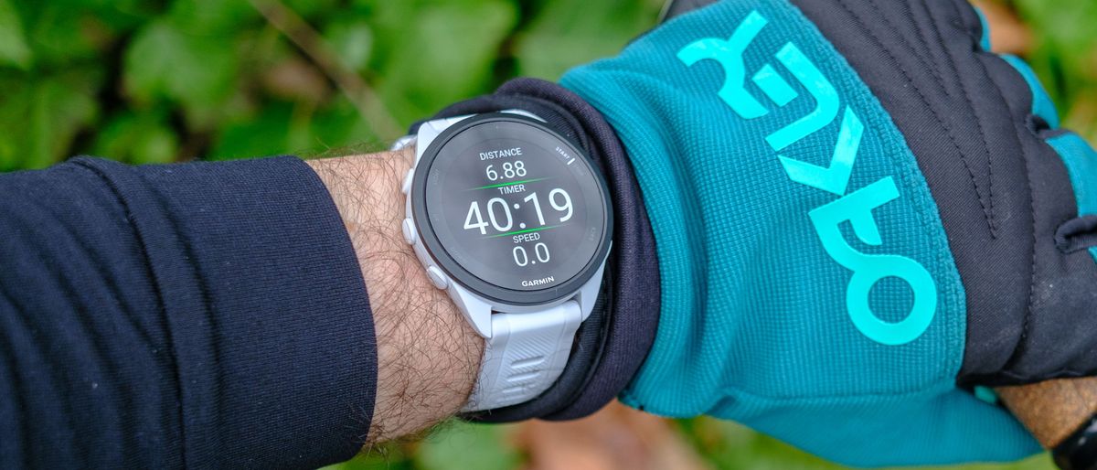 Garmin Forerunner 165 handson a sporty, GPSequipped smartwatch for