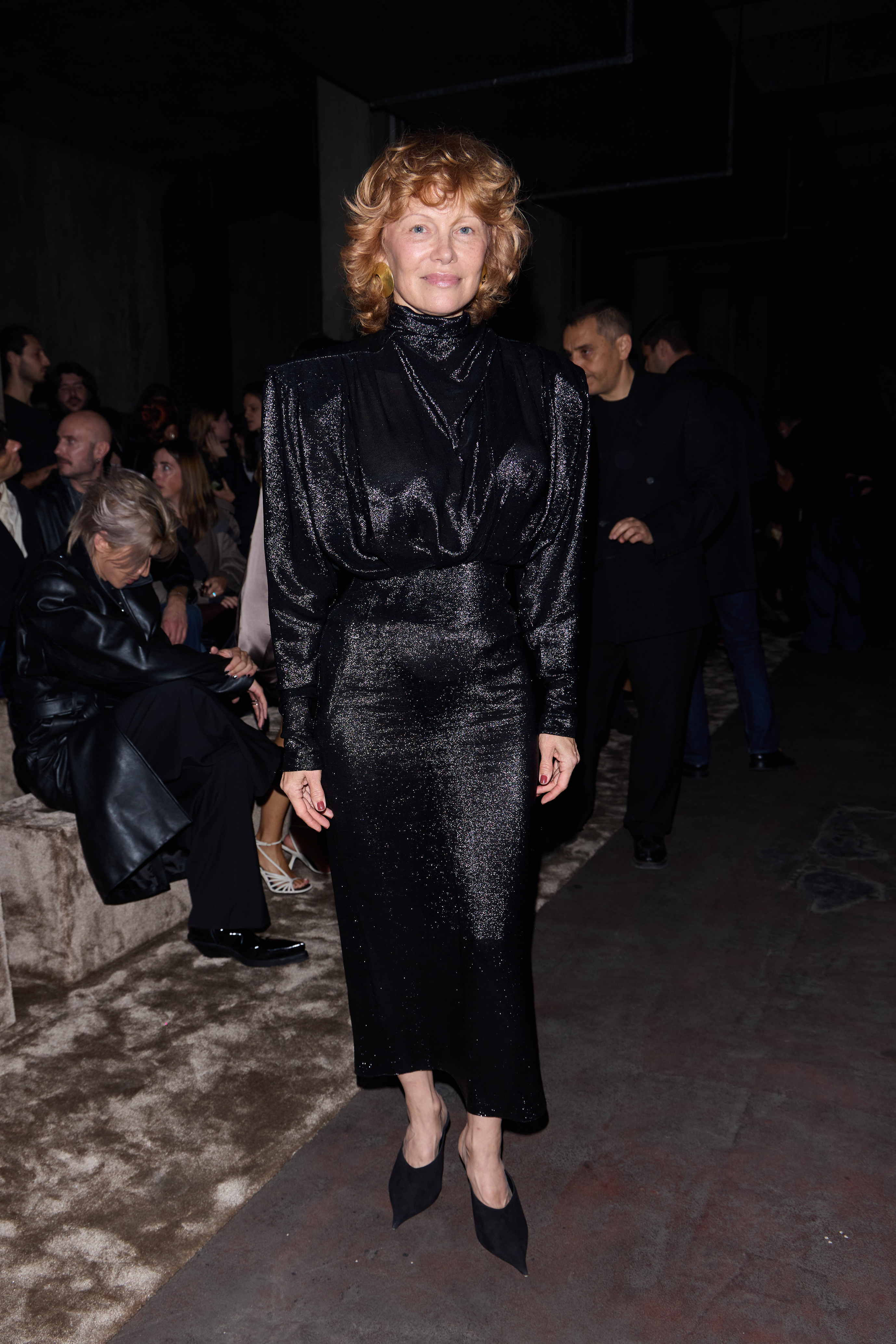 Pamela Anderson wearing a mullet-like hairstyle at the Mugler show at Paris Fashion Week