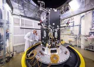 The Solar Probe Plus spacecraft is prepared for thermal acuum tests to simulate the space environment. Picture taken at the Johns Hopkins University Applied Physics Laboratory in Maryland.