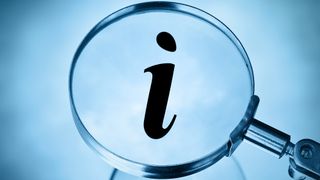 Magnifying glass with an information symbol magnified in blue tone